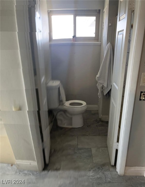 bathroom featuring toilet