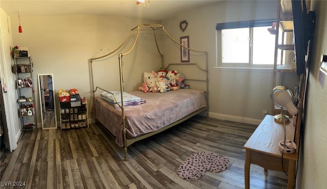 bedroom featuring dark hardwood / wood-style floors