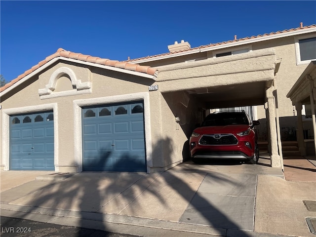 view of front of property with a carport