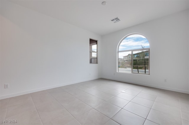 view of tiled spare room