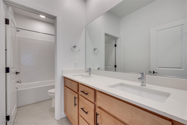 full bathroom with shower / bathing tub combination, vanity, toilet, and tile patterned floors