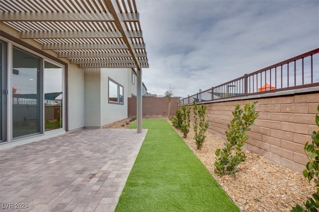 view of yard featuring a pergola and a patio area