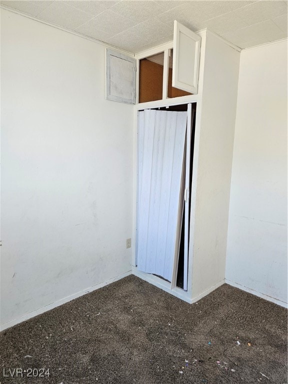 unfurnished room with carpet floors