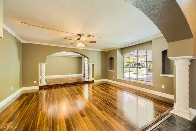 unfurnished living room with ornamental molding, ceiling fan, and hardwood / wood-style flooring