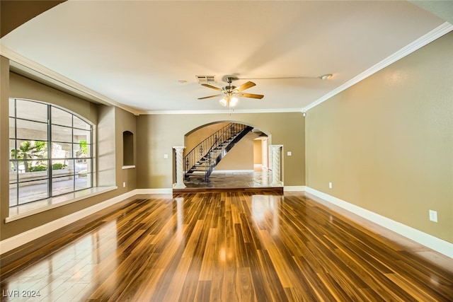 unfurnished living room with ceiling fan, hardwood / wood-style flooring, and ornamental molding