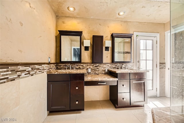 bathroom featuring vanity and tile patterned flooring