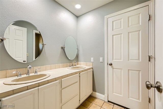 bathroom with vanity and tile patterned floors