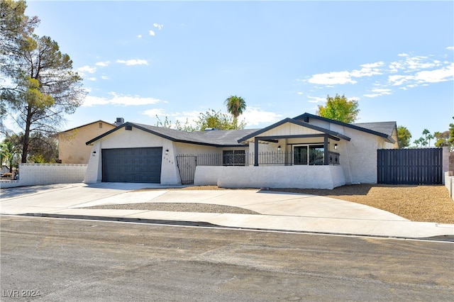 ranch-style home with a garage