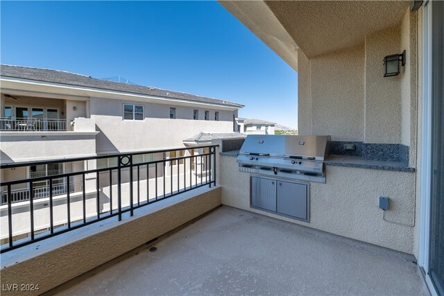 balcony featuring area for grilling