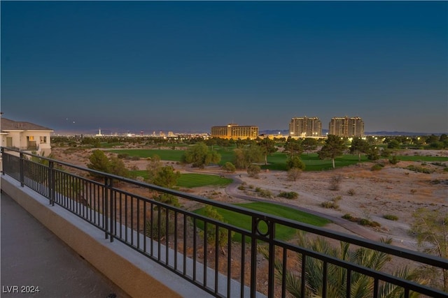 view of balcony at dusk