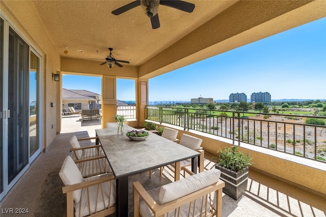 balcony featuring ceiling fan