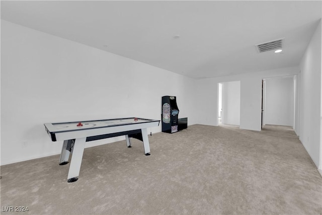 playroom featuring light colored carpet and visible vents