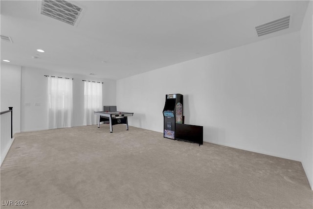 interior space featuring carpet floors, visible vents, and recessed lighting