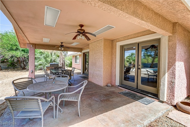 view of patio / terrace with ceiling fan