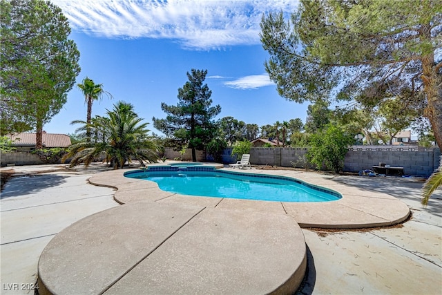 view of pool featuring a patio area