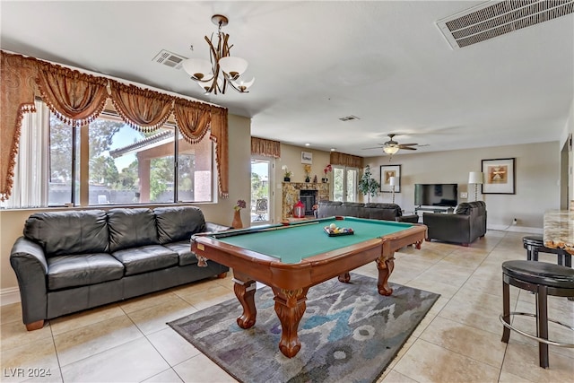 rec room with ceiling fan, light tile patterned floors, plenty of natural light, and pool table