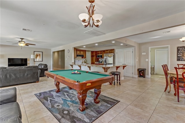 recreation room featuring ceiling fan with notable chandelier, sink, light tile patterned floors, and billiards