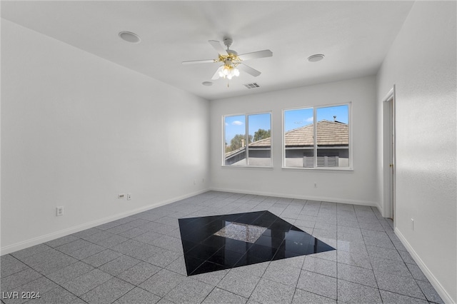 unfurnished room featuring ceiling fan