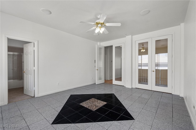 unfurnished room featuring ceiling fan and french doors