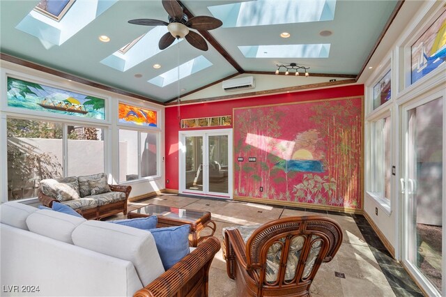 living room with lofted ceiling with skylight, ceiling fan, and a wall unit AC