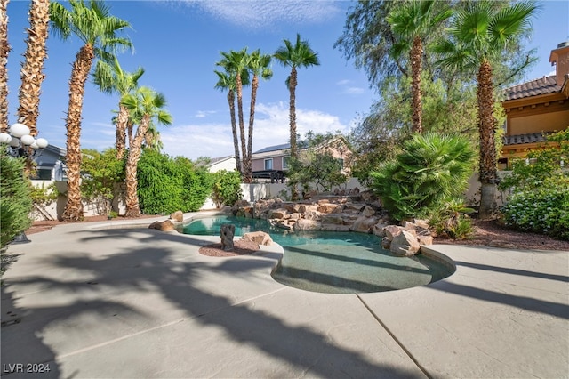 view of swimming pool featuring a patio area