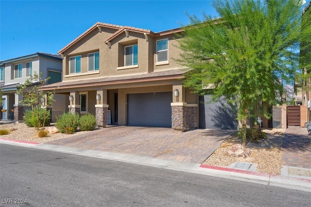 view of front of home with a garage