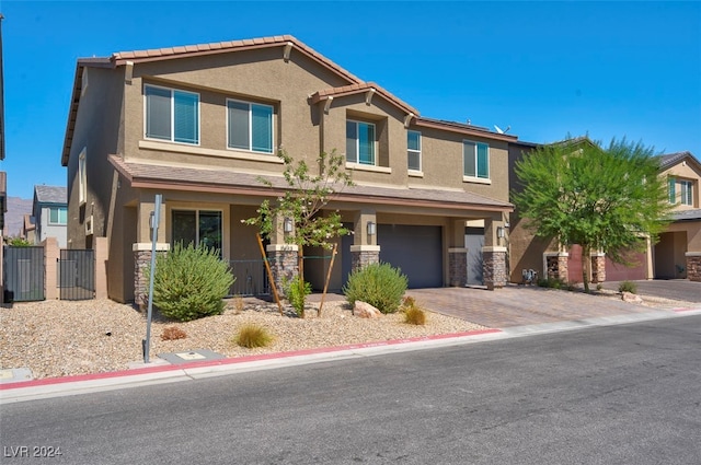 view of front of property with a garage