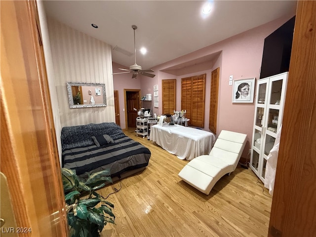 bedroom featuring ceiling fan and hardwood / wood-style floors