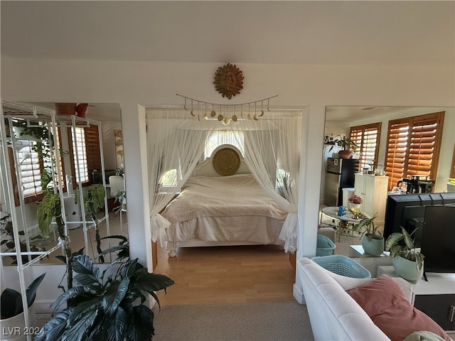 bedroom featuring hardwood / wood-style floors