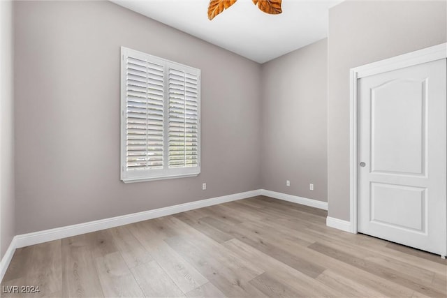 spare room featuring light hardwood / wood-style flooring