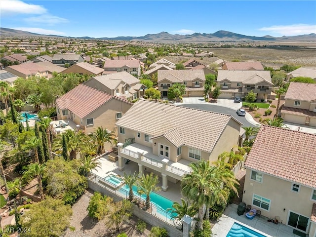 drone / aerial view featuring a mountain view