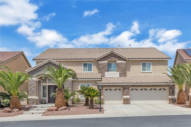 mediterranean / spanish-style home featuring a garage