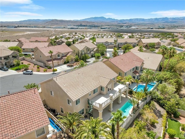 drone / aerial view featuring a mountain view