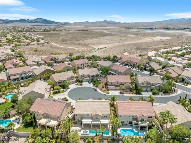 bird's eye view with a mountain view