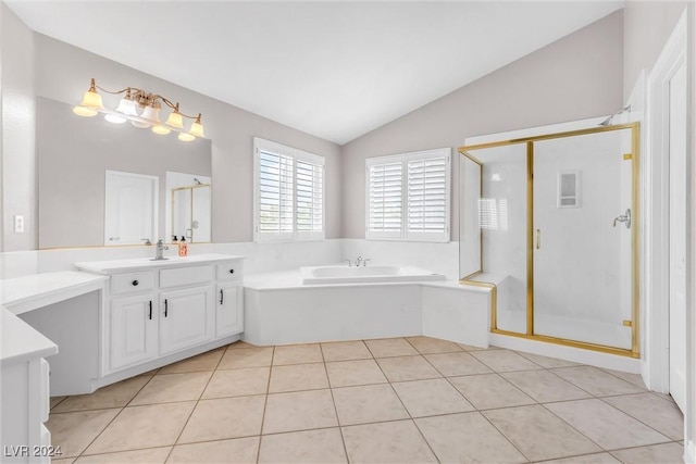 bathroom with tile patterned flooring, vanity, vaulted ceiling, and plus walk in shower