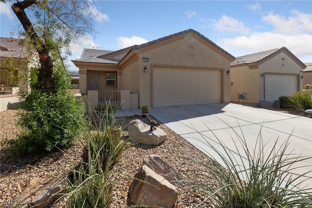 view of front of property with a garage