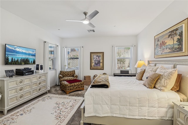 carpeted bedroom with ceiling fan