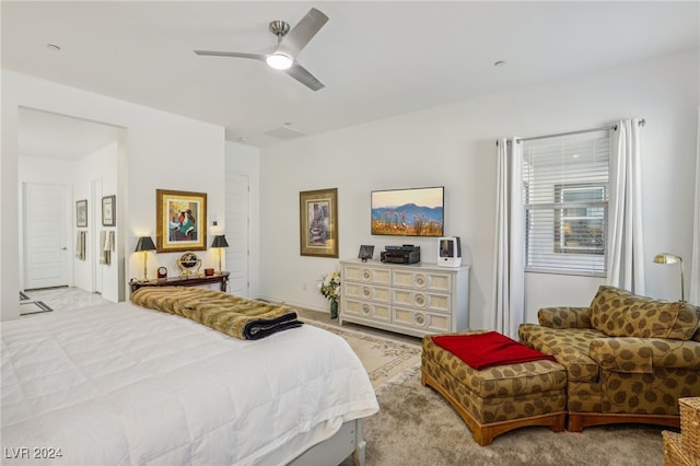 carpeted bedroom featuring ceiling fan