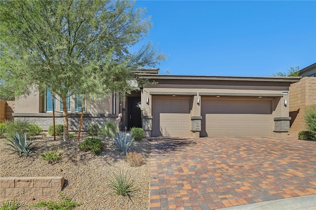 view of front of property with a garage