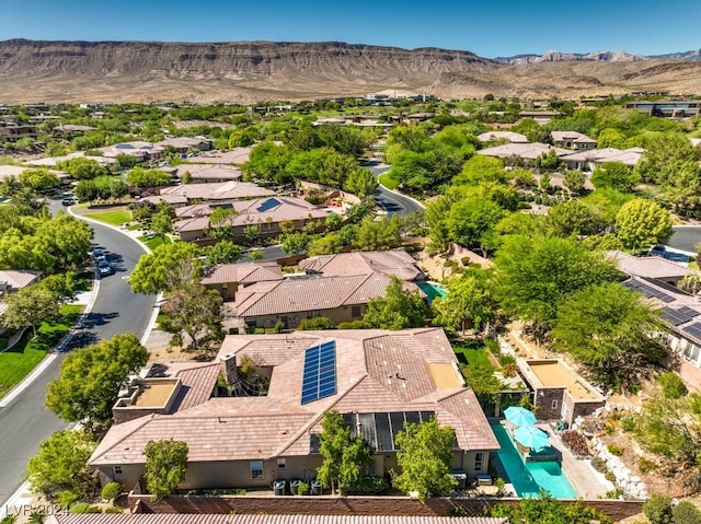 drone / aerial view featuring a mountain view