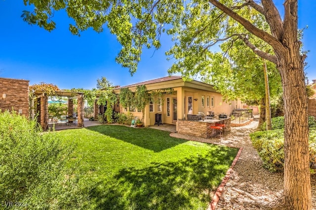 view of yard featuring exterior bar and a patio area