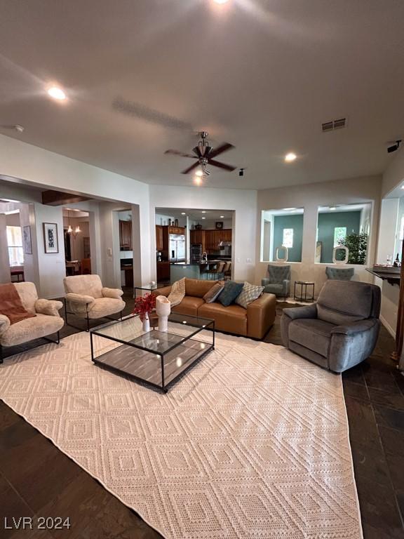 living room with ceiling fan