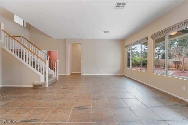 empty room featuring light tile patterned floors