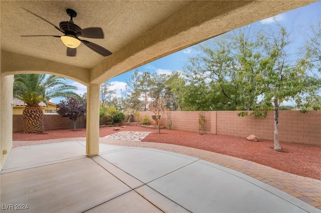 view of patio / terrace featuring ceiling fan