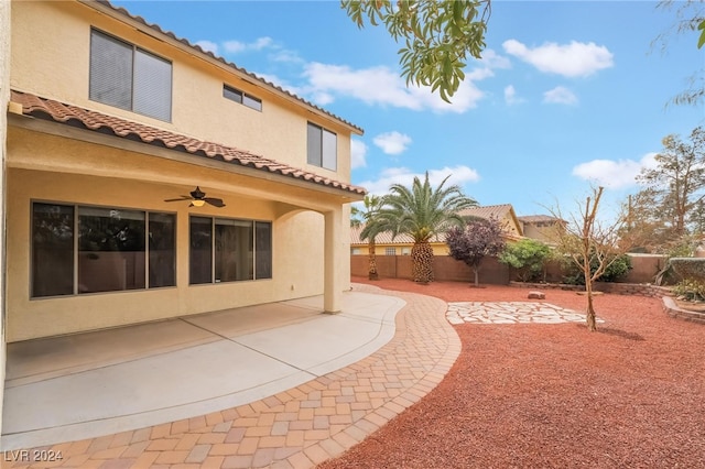 exterior space featuring ceiling fan and a patio