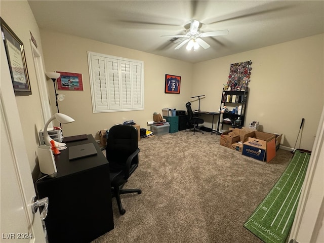 home office featuring ceiling fan and carpet flooring