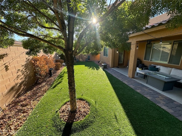 view of yard featuring a patio and an outdoor living space