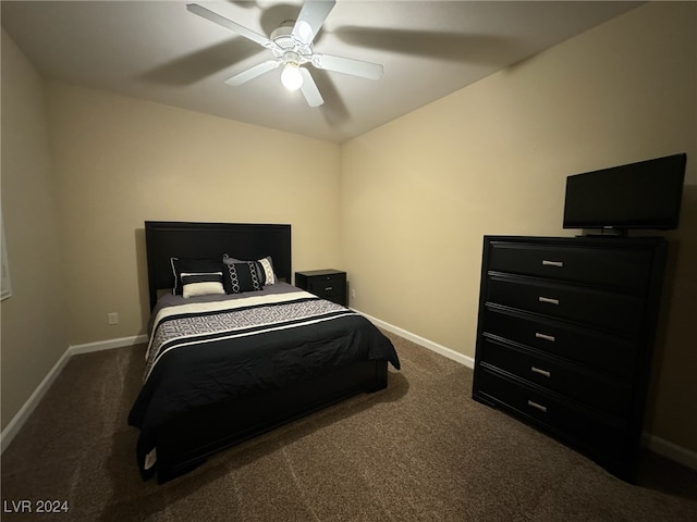 bedroom with dark carpet and ceiling fan