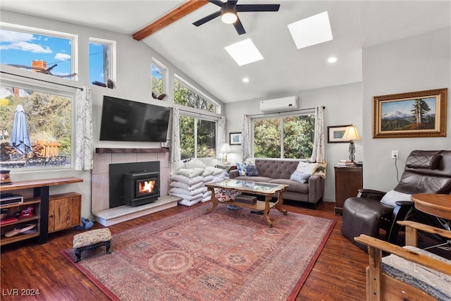 living room featuring a wood stove, ceiling fan, dark wood-type flooring, beamed ceiling, and a wall mounted AC