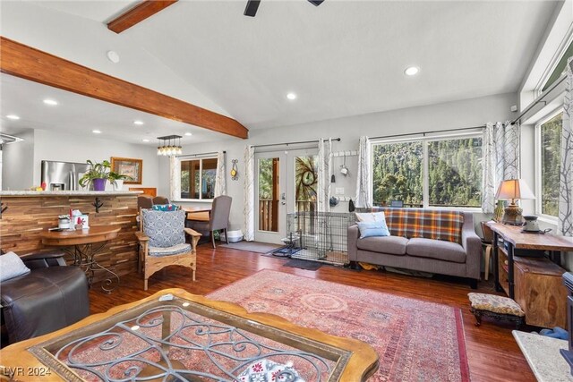 living room featuring lofted ceiling with beams, dark hardwood / wood-style floors, ceiling fan, and french doors